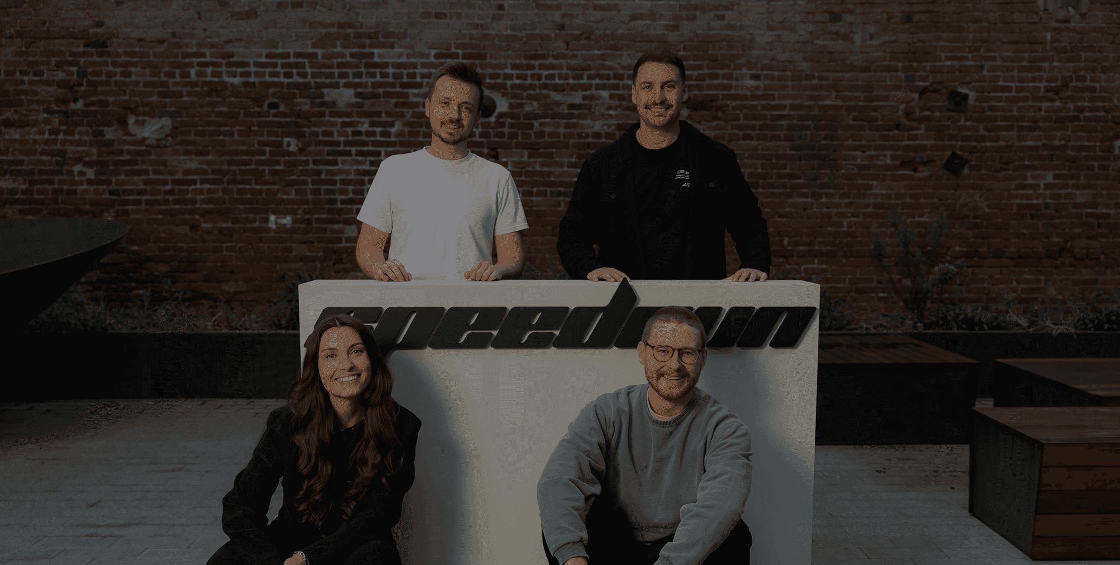 The four founders of Pluvo standing together