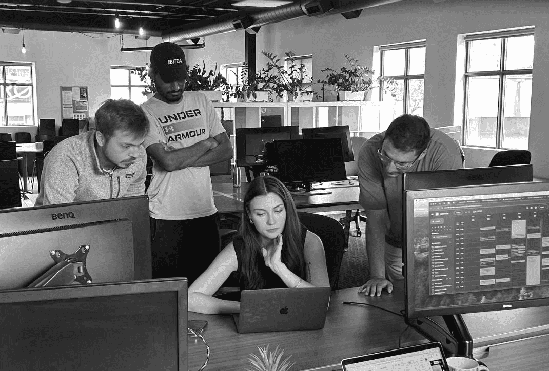 The Pluvo team working together in the office
